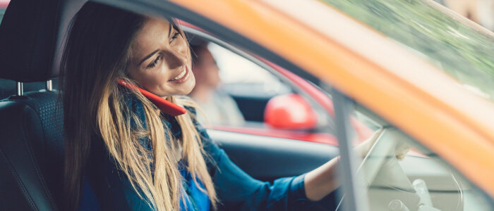 A woman on the phone and distracted