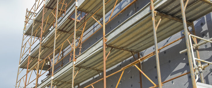 Metal scaffolding near a building.